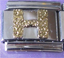 Lettre H doré texturé